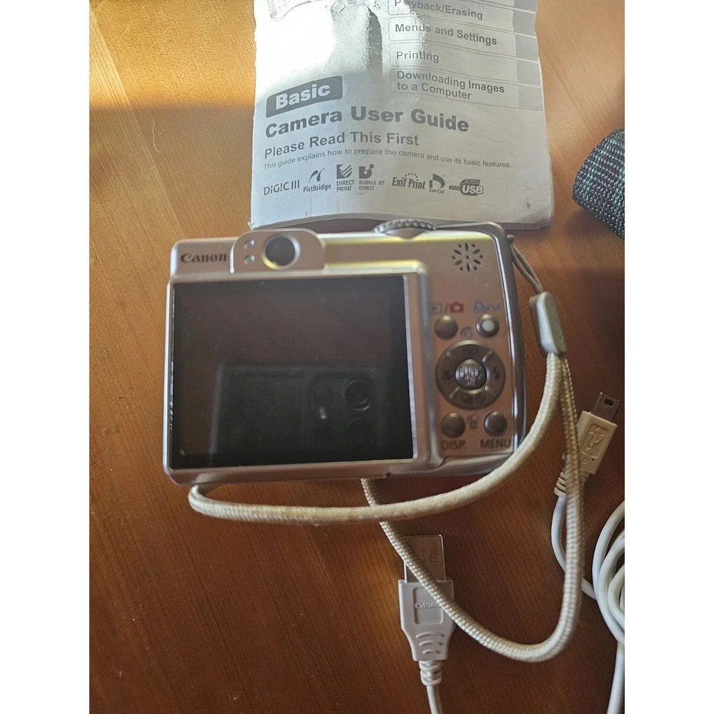 Canon PowerShot A560 7.1MP Digital Camera - Silver Read Description